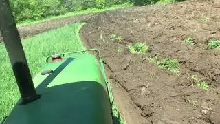 John Deere 2950 plowing sod