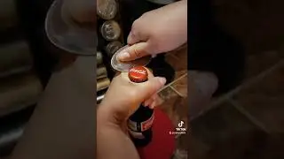 How to open a bottle with a spoon.