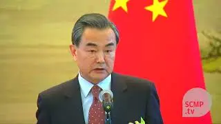 China defends actions on disputed island