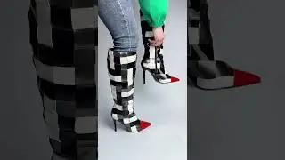 Black and white checkered high heels knee high boots, in the style of afrofuturism-inspired.