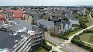 Compilation of aerial footage clips of a modern middle class housing development in Essex, UK.