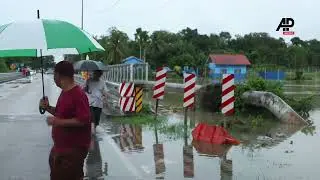 Flash floods submerge streets, forcing over 40,000 to evacuate in northern Malaysia