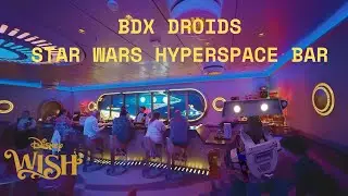 A BDX Droid invades the Star Wars Hyperspace Bar on the Disney Wish