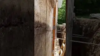 Bowing foundation wall repair in St. Charles MO using plate anchors