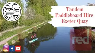 Red tandem paddleboard hire at Exeter Quay. Daddy, daughter day out.
