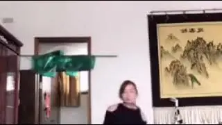 Crippled girl limping with a legbrace.