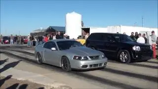 SRT8 Jeep Cammed and on Nitrous vs Pullied 04 Cobra 1/8 Mile