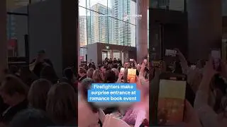 Firefighters make surprise entrance at romance book event 😄