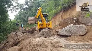 Jcb 3dx super clearing road block