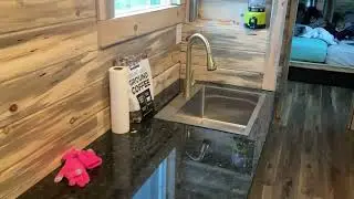 Appliances installed in container house. Colorado corrugated living