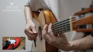 I combined a classical guitar with a Wah pedal.