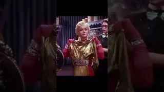 Debbie Reynolds&rsquo; Gold Dream Dress Was Hollywood&rsquo;s Cleverest Meta Moment