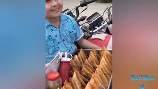 Cute boy selling samosa
