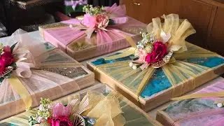 Wedding suit packing in Pinewood trays #weddingdresspacking #sareepacking