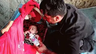 Feeding baby formula by nomadic father & taking care of the baby & Continue to restore the cottage