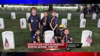 Scouts place 42,000 flags on military graves