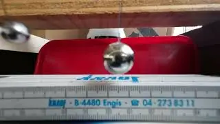 SLOW MO collision steel balls (4.10g VS 13.80g) with ruler