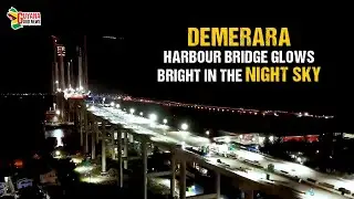 Demerara Harbour Bridge Glows Bright in the Night Sky
