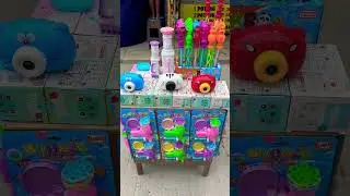 Pistol buble dan stik gelembung sabun warna warni