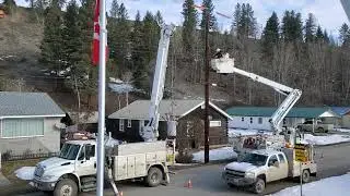 Fortis BC raising new transformer to resting home on pole!