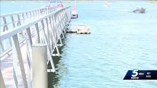 70-year-old rescued after being pinned in boat under dock