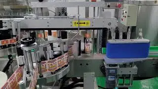 Двустороннее этикетирование круглых бутылок с дополнительной маркировкой горлышка