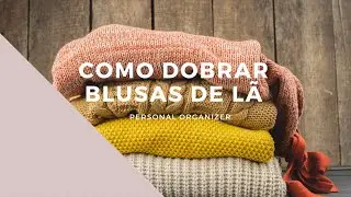 Como dobrar blusas de lã.