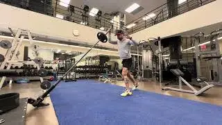 Landmine drop step lunge to press