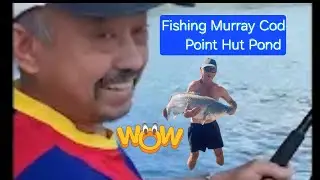 FISHING AT POINT HUT POND, GORDON , ACT, AUSTRALIA 