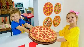 Trẻ học c&aacute;ch nấu pizza v&agrave; gi&uacute;p đỡ lẫn nhau