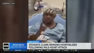 Stevante Clark remains hospitalized following mild heart attack