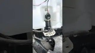 Mitsubishi eclipse cross wiper tank with wiper motor location