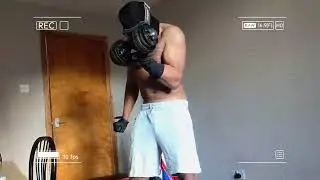 CURLING BICEPS IN TRAP HOUSE