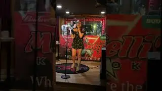 Jamie singing karaoke in Nashville
