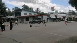 Dancing traffic enforcer in Dumingag highway intersection by Arne Jane D Arcilla (^o^)
