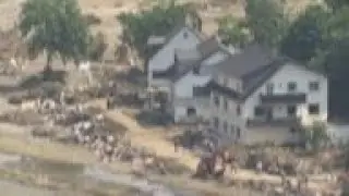 Clean up after flooding in German village of Dernau