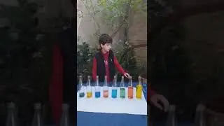 Omar Hamzah Making Xylophone from glass bottles.. English session