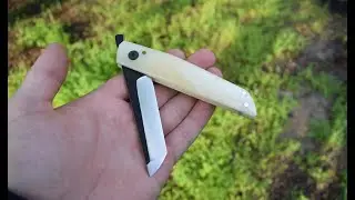 Handmade Friction folder with M390 steel blade and camel bone on handle