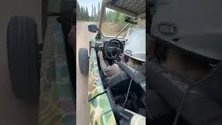 Woman Drives with Hand Controls in the Backcountry