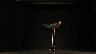Circus Performer on the Free Standing Ladder j11LW2170726