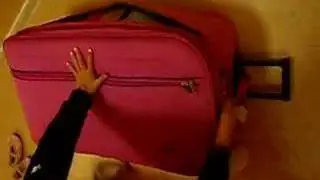 Trish in a suitcase