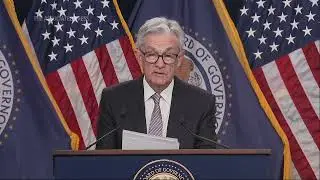 Fed Raises Key Rate But Hints It May Pause