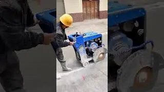 Concrete pavement cutting machine
