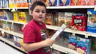 Truman grabbed WHAT @GeneralMills #cerealbox at MACEYS??!