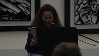 Diana Raab reading poetry at art gallery of Robert Firestone