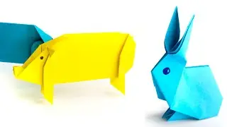 Cerdo de papel vs. conejo de papel. Idea de origami.