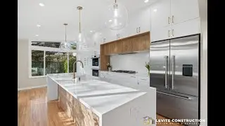 Kitchen Remodel in Magnolia, Seattle featuring sleek white European cabinets | Levite Construction