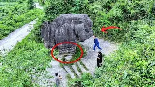 贵州大山居然藏着一块奇石， 上粗下细看着十分危险，轻轻一推石头就会动