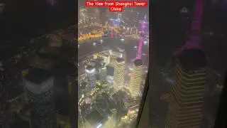 Pudong&rsquo;s skyscrapers spread out below with Huangpu River curving through it #travel #lights #city