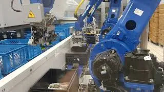 IMPIANTO ROBOTIZZATO PER CONFEZIONAMENTO CASSETTE IN MENSA INDUSTRIALE